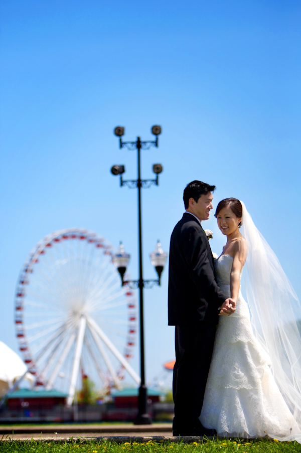 wedding photo by Bob and Dawn Davis Photography, ferris wheel, bride and groom 